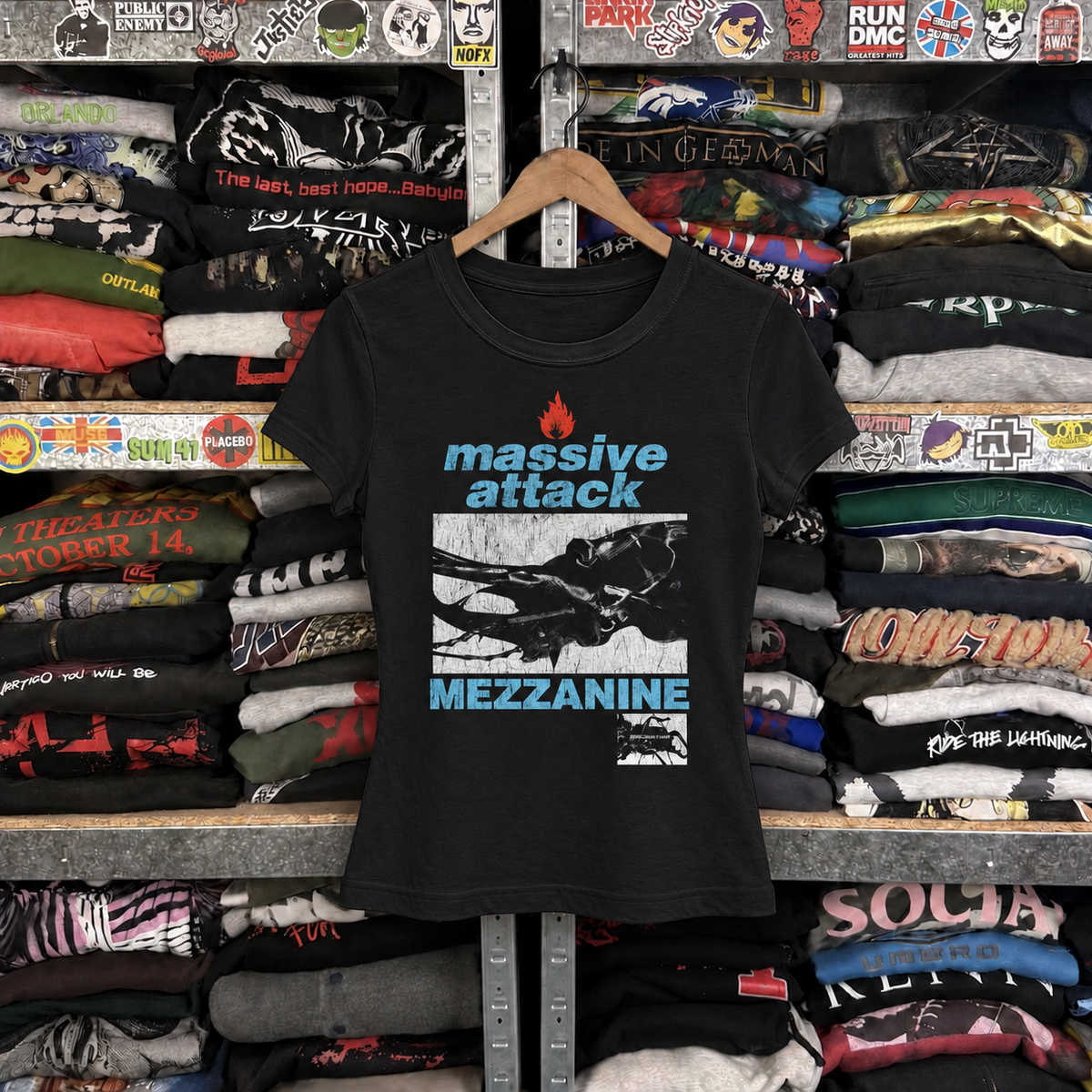 1998 Massive Attack Mezzanine Euro Tour Rare Womens Black Tee — off-body front on wooden hanger