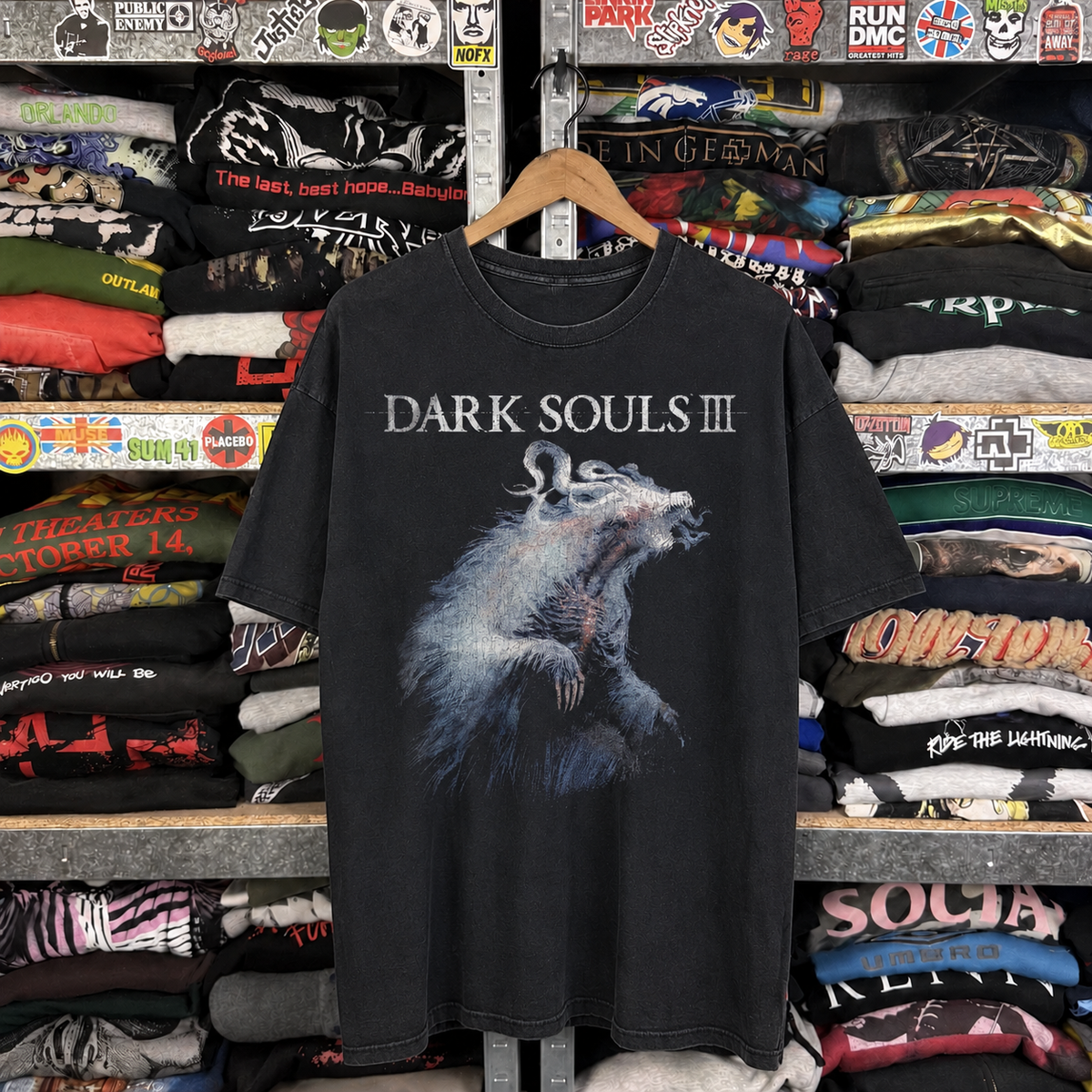 Dark Souls III Elter Ghru Vintage Washed Black T-Shirt — off-body front on wooden hanger