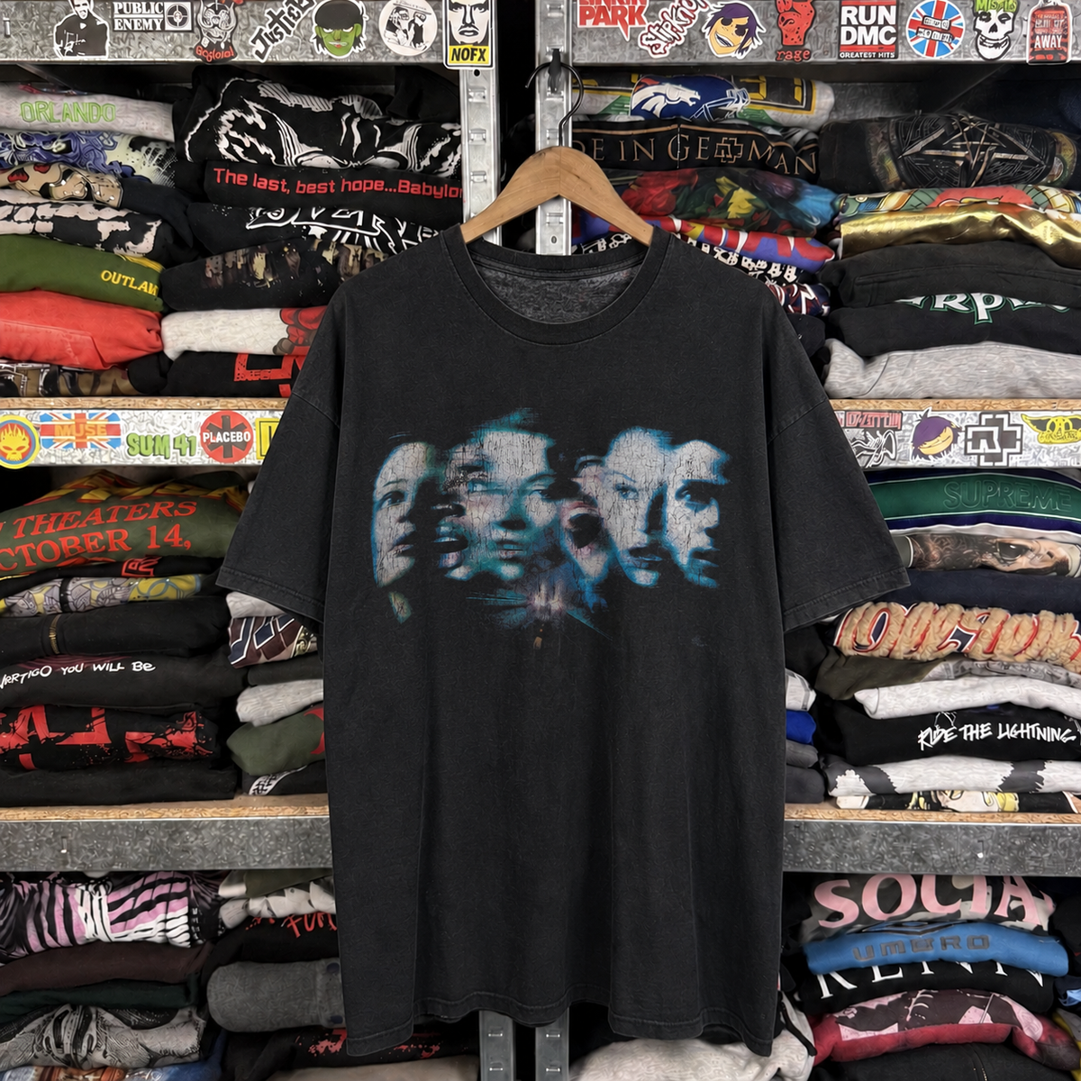 Y2K Final Destination 2 Promo Rare Washed Black T-Shirt — off-body front on wooden hanger