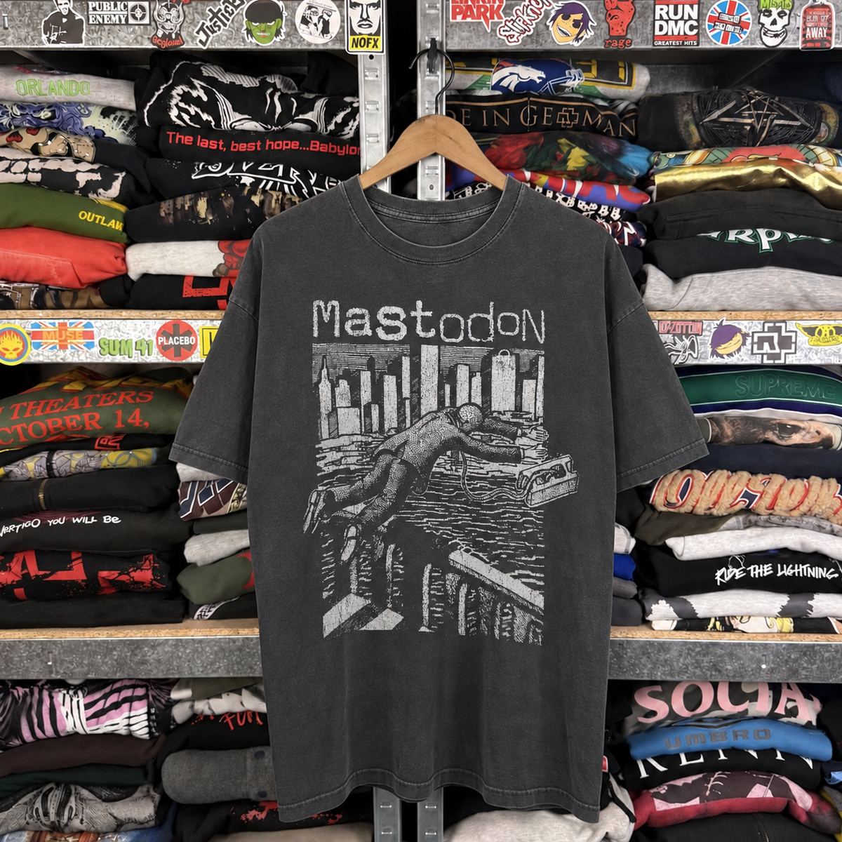 Y2K Mastodon 'The Jumper' Rare Washed Black T-Shirt — off-body front on wooden hanger