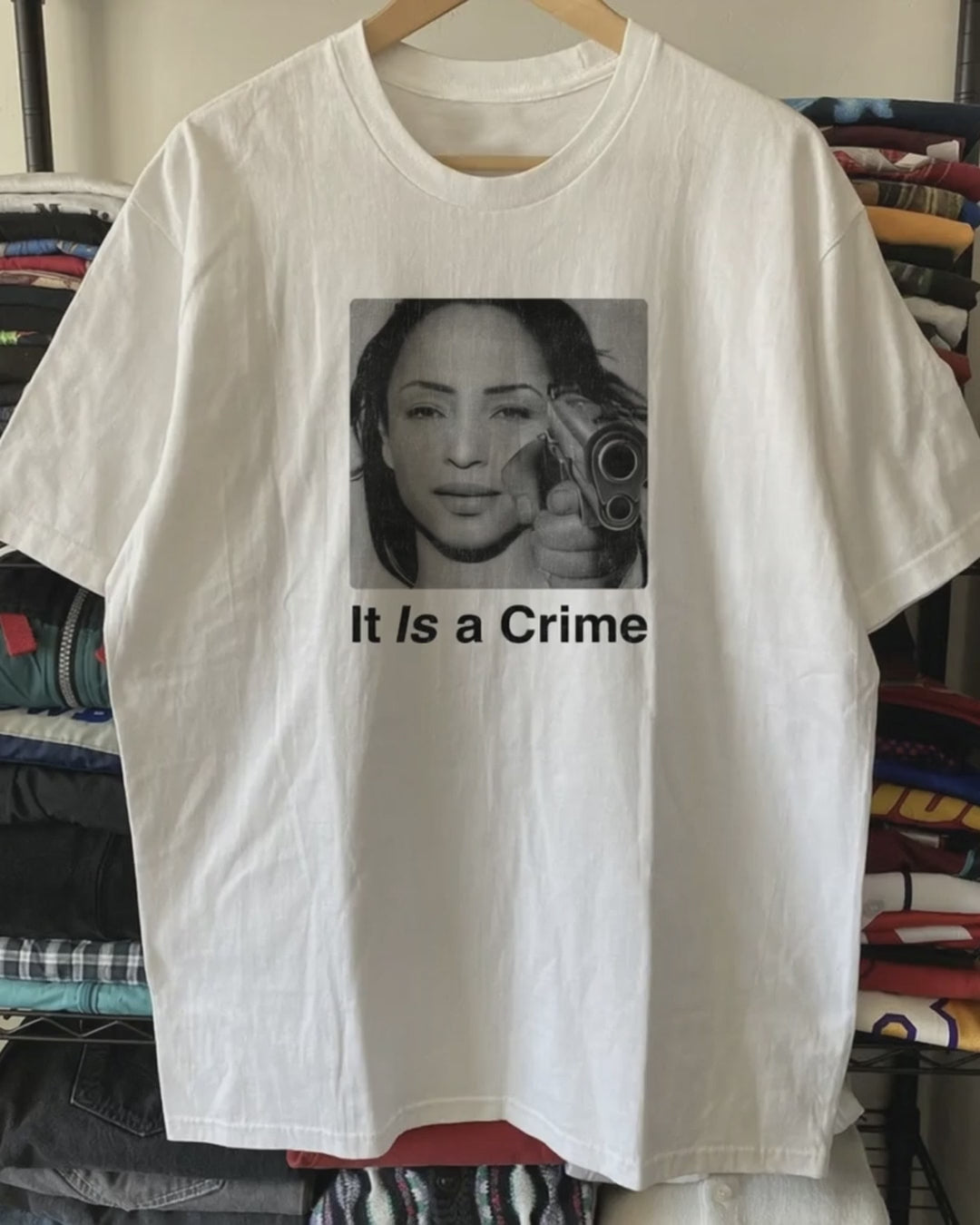 90s Sade Parody It Is a Crime Washed White Tee product video [GB-DPA:442aba17c6ba]